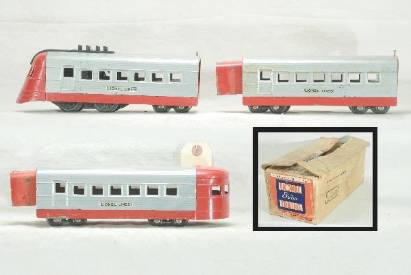 Boxed Lionel Jr set 6204: Uncataloged circa 1936, 1700 diesel, 1701 coach, 1702 observation, silver painted version, clean and evenly matched set, track, osb worn, bright label, Has moderate play wear.
