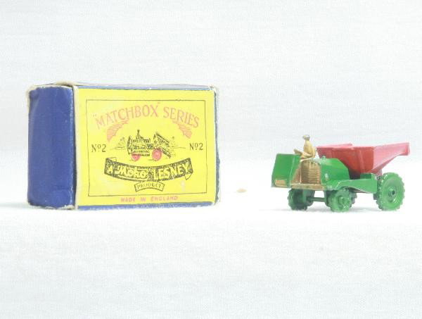 Rare Boxed Matchbox 2 green wheels: Shows light to moderate playwear. First series smaller casting. Dump bed has brad used as hinge, rear axel is unpainted, probably replaced, Rare scripts Moko Lesney ob shows wear. For Bigger and Bette