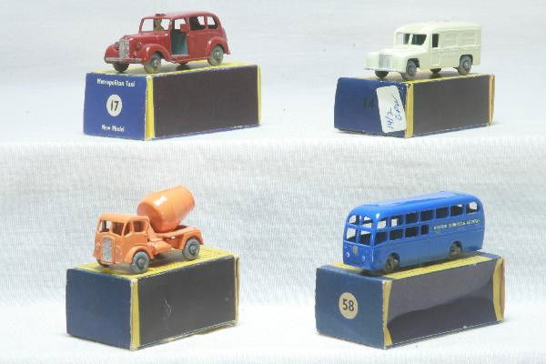 4 Boxed Early Matchbox Vehicles: Like New models 17, 58 with 100 decals, 26 & 14, all Gray Plastic Wheelss, Moko Lesney obs show minor darkening. For Bigger and Better photos or information about consigning in our future events go to
