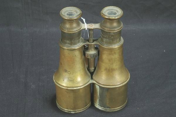 Early Brass Binoculars: 8" Long, fully extended, unmarked, glass optic are intact, tarnished patina. For Bigger and Better photos or information about consigning in our future events go to our website
