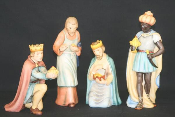 4 Hummel Nativity Figurines: 214B Joseph 7 1/4" T. 212M King on One Knee, 5 1/2" T. 214L King on Two Knees, 5 1/2" T. 214L King Standing, 8" T, has professional repair to head, all stamped Goebel. Free From Cracks Flakes and Chip
