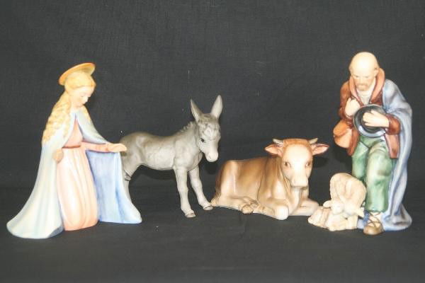 4 Hummel Nativity Figurines: 24K Ox, 7" Long. 214J Donkey, 5" Tall. 214A Virgin Mary, 6 3/4" Tall. 214F Sheppard Standing, 7" Tall. All stamped Goebel. Free From Cracks Flakes and Chips. For Bigger and Better photos or informatio