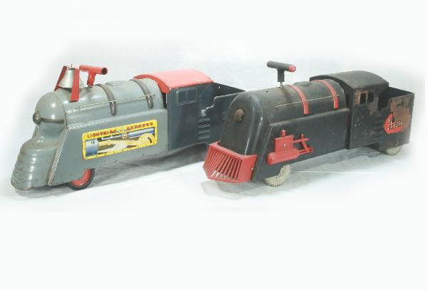 2 Marx Ride-on Trains: Each 26" Long. 3000 Lightning Express with litho side plates shows Moderate to Excessive playwear. Pioneer Express is ready to be restored. For Bigger and Better photos or information about consigning