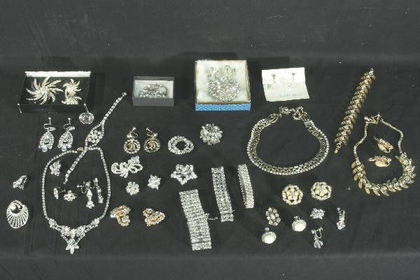 40 Plus Piece Vintage Costume Jewelry Lot: Broaches, Earrings, Necklaces & Bracelets, various styles, several sets, all used and show some wear. For Bigger and Better photos or information about consigning in our future events go to our websit