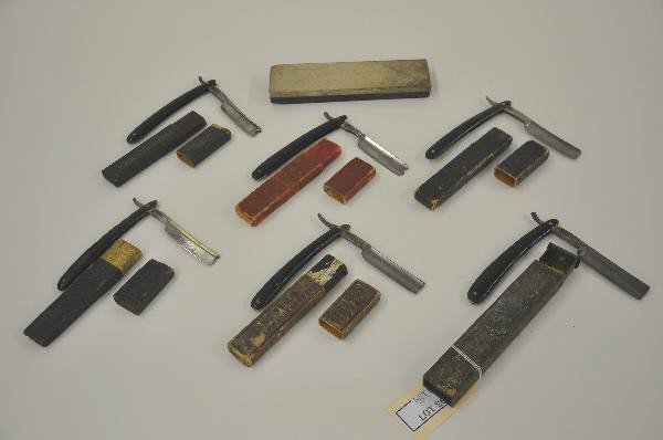 7 Vintage Straight Blades in boxes: Progress Razor with worn tin box, carved deer handle. H. Boker & Co Red Injun #101 Razor with box. G. Wostenholm & sons razor with worn box. Tonsorial Gem razor, Germany, original box. Erik Anton Berg