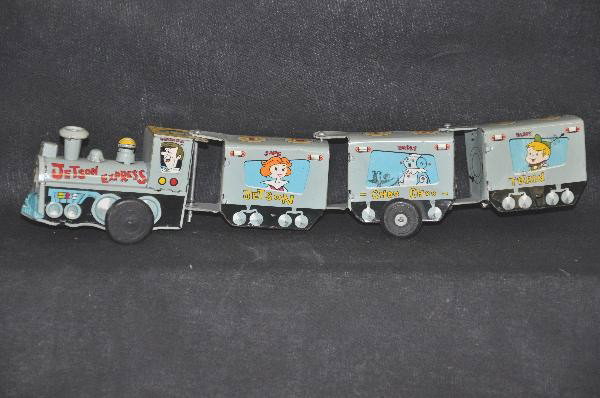 Scarce Marx Jetsons Express Crazy Train: Shows light playwear, litho tin, 12 1/2" long, functional & clean. For Bigger and Better photos or information about consigning in our future events go to our website