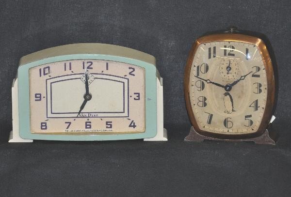 2 Art Deco Connecticut Clocks: 1936 Ingraham(Bristol, CT) "Penguin" Clock, some scratching on case sides & back. 1939 Lux (Waterbury, CT) " Van Dyke" model, 7 1/4 X 4 1/4", shows light to moderate wear, but clean. Clocks, Radios an