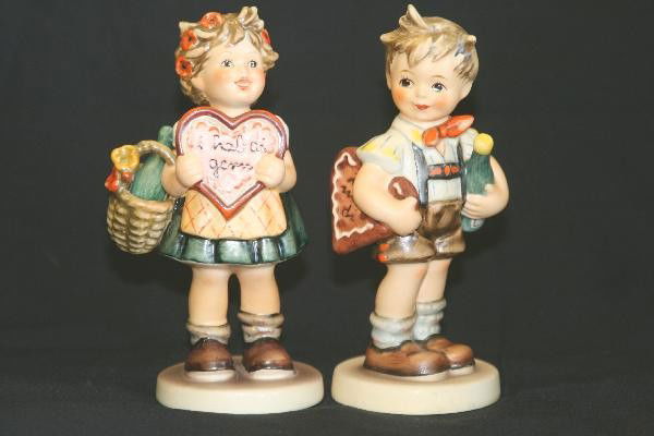 2 Hummel Valentine 387 Gift & 399 Joy: Both collectors club editions, 387 from 1972 in German, 399 from 1979, both 6" tall. Free From Cracks Flakes and Chips. For Bigger and Better photos or information about consigning in our future event