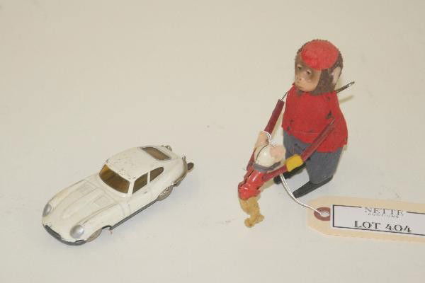 Schuco Monkey with Mouse Toy: 4 1/2" Tall, mechanism functional with key, toy vibrates and mouse is lifted up and down, some moth damage to felt clothes, feet properly marked Schuco. For Bigger and Better photos or information abo