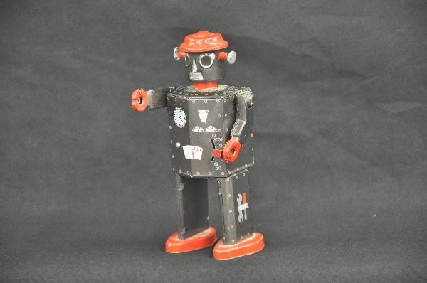 Small Tin Robot: 5" Tall, functional, litho tin, no maker marked, some rust on bottom inside feet. For Bigger and Better photos or information about consigning in our future events go to our website