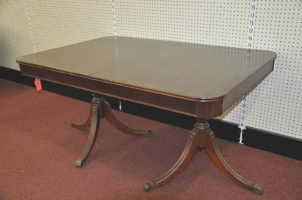 1930s Mahagony Dining Room Table: 60 X 41" with 10" automatic leaf, functional, 2 3-leg Duncan Fyffe pedestal legs with brass fittings, has light water ring on top, otherwise clean & shiny. For Bigger and Better photos or information