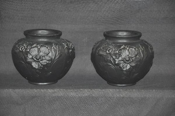 2 Tiffin Glass Vases: 7" Round X 5 1/2" tall. Satin glass with poppy pattern, unblemished. For Bigger and Better photos or information about consigning in our future events go to our website