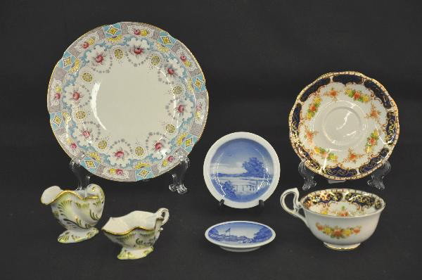 7 Pc. China Lot: 2 Royal Copenhagen butter pates, Royal Standard Cup & Saucer with stand. Herendhvngar Demitasse creamer & sugar. 8" Royal Stuart Plate, all show minor wear with no chips or flakes. For Bigger and Bett