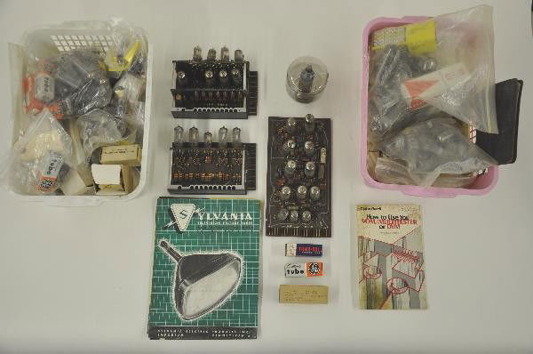 Large Lot TV & Radio Vacuum Tubes: Most unboxed, various sizes and shapes, a few tube racks included. Sold AS-IS For Bigger and Better photos or information about consigning in our future events go to our website