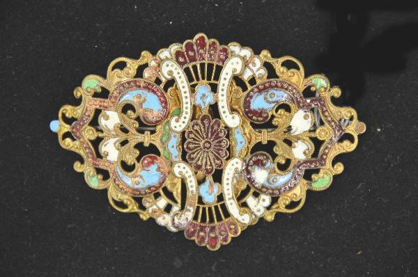 Ornate Art Nouveau broach: 3 1/4" brass lace broach with colorful enamel work, has pin back over scarf loop on back, Minor wear to enamel. For Bigger and Better photos or information about consigning in our future events go to 