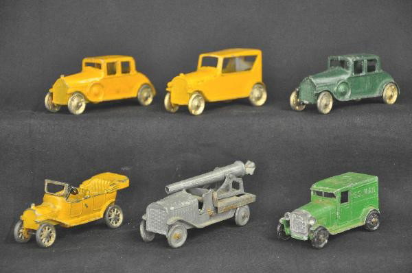 6 Early TootsieToy Vehicles: Closed & Open Tourer, 2 coupes, US Mail Truck & Truck with Field gun. For Bigger and Better photos or information about consigning in our future events go to our website