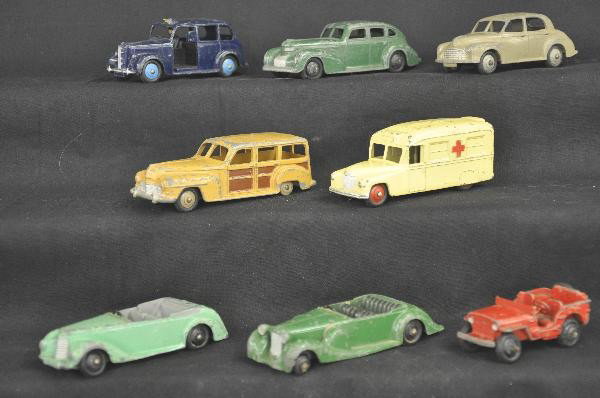 8 Pc. Dinky Toy Lot: 40G Morris Oxford, 38C Lagonda, missing wind screen, 39E Chrysler Royal Sedan, 38E Armstrong Siddley, missing windscreen, 30H Damlier Ambulance, 254 Austin Taxi, 344 Estate Car, Red Jeep has broken wi