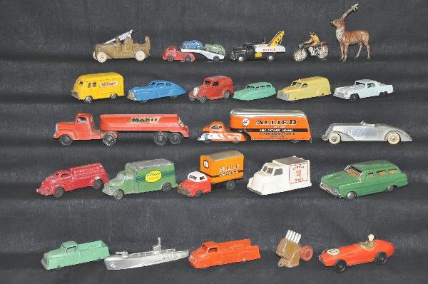 20 Plus Piece Small Vehicle and Figure Lot: Mixture of TootsieToy, Slush & Japanese Tin vehicles, Heyde Reindeer, Elastolin Dispatch Rider, various conditions. For Bigger and Better photos or information about consigning in our future events go