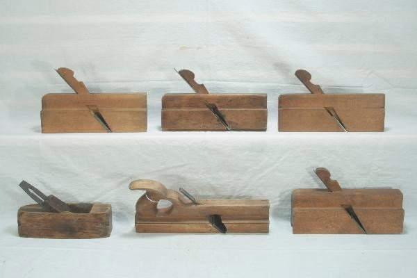 6 Early Plane Tools: 1 block plane, others are` molding planes with different cuts, complete & clean. For Bigger and Better photos or information about consigning in our future events go to our website
