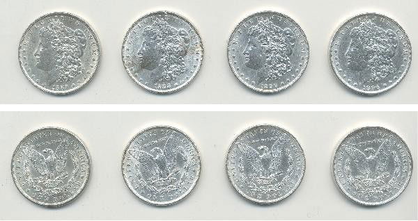 4 Morgan Dollars.: Includes: 1889, 1888, 1896, 1896. In our opinion, grade this lot as XF to AU. View picture carefully to determine condition. For Bigger and Better photos or information about consigning in our future