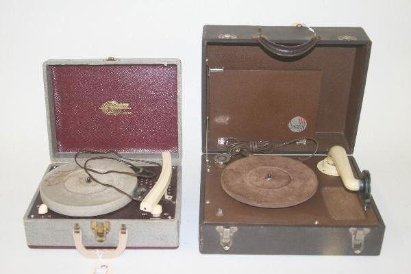 2 Early Record Players: Silvertone 78 Player. Chome compartment contains extra needles. Leather case shows some wear. Beam count player 78/33 speed. Center platform stained includes needle and cartridge. Case shows some wear