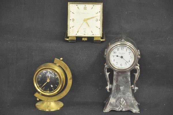 3 Metal Art Deco Clocks: 1934 New Haven cabinet topper, 6" tall. 1950 Tiffany & Co Brass table clock 3 3/4" Sq. Bulova Globe Clock with brass case, 4 1/2" Tall. Clocks, Radios and other electrical devices are being sold as un