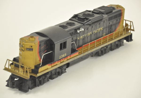 Lionel 2349 NP GP9 Diesel: Battery box clean, screw crack 1 side, shows Moderate Playwear.
