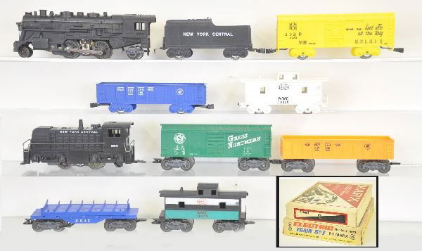 Boxed Marx Sets 9722 & 26665: Set 9722- 1666 Steam Loco; NYC Tender PRR Gondola; SF bright yellow Boxcar; 18326 NYC Caboose(broken), track & transformer, set box with inserts; Set 26665- 588 NYC Diesel; GN Boxcar; Orange PRR Gondo