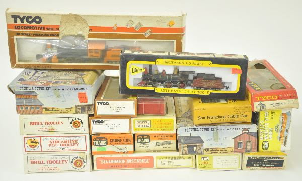 22 Pc. Boxed HO Gauge Lot: Tyco, Bachmann & Life-Like, several locomotives and Trolleys, freight cars and kits, some original boxes are worn, overall trains are Like New.