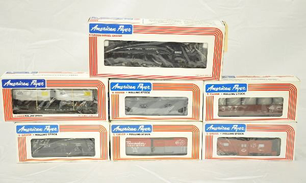 7 Boxed Lionel/American Flyer S-gauge Train Set: 4-8552 NY Central GP-9 Diesel loco; 4-9706 NY Central box car; 4-9106 NY Central 3 dome tank car; 4-9005 NY Central flat car and vans; 4-9304 NY Central gondola and canisters 4-9304; 4-9206 NY Central