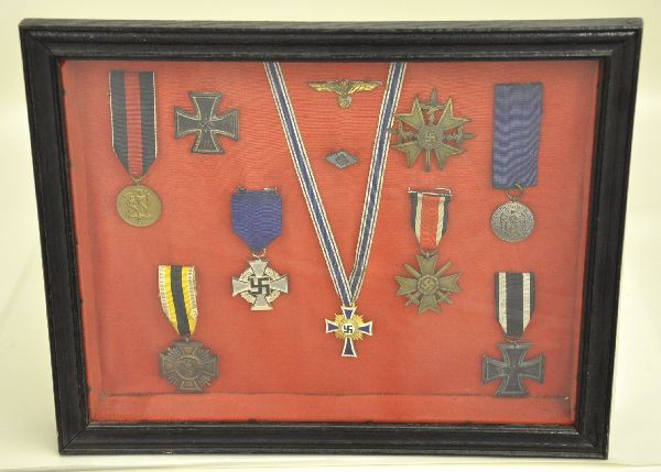 WW II German Medal in Shadow Box: 13 x 11" framed shadow box includes, bronze Sudetenland occupation medal Oct 1938, Gilded gold class mothers award for producing 8+ children, 1939 First Class SS Cross, 25 yr service medal, service cr