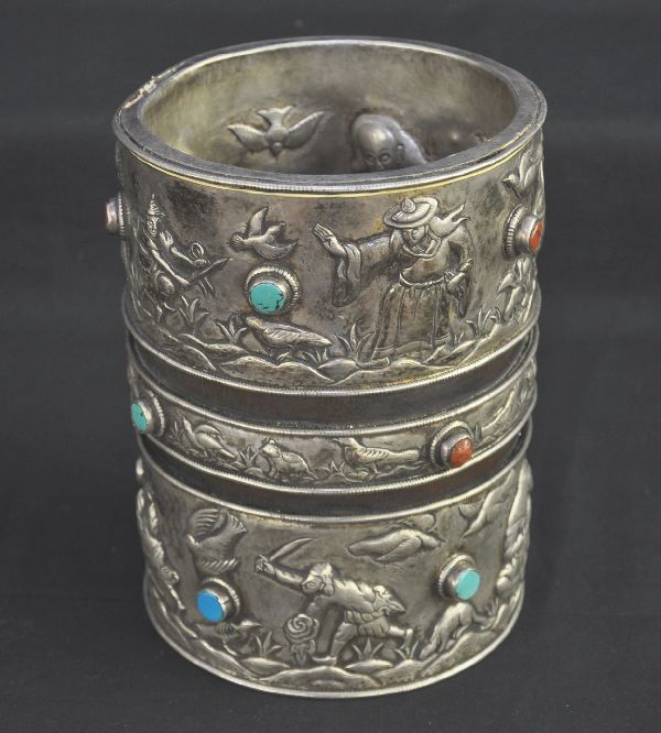 Fantastic 19th Century Tibetan Silver Brush Bucket: 8" x 6" wide, heavily embossed inside and out with figures, birds, animals, and 14 semi-precious stones, shows signs of minor use, very heavy.