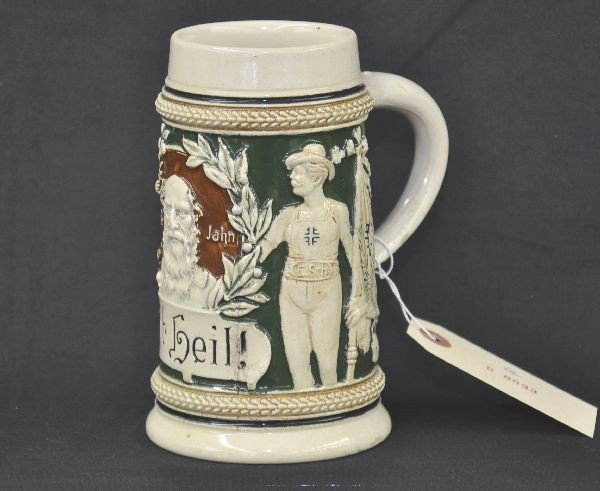 Porcelain Beer Stein: Half liter stein with figural motif Father John in vignette on front, with Guf Heil title, has man and women and German country flag, clean with no visible damage.
