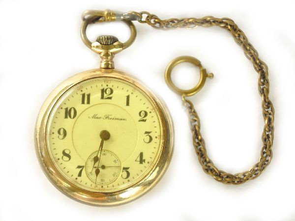 Rockford Watch Company Pocket Watch: 2 3/8" 21 jewel, serial #535128, porcelain face signed Max Freiman. Clean and shows no wear, hands have rust; gold filled Keystone watch case serial #5292119, shows major edge wear, crystal is yellow 