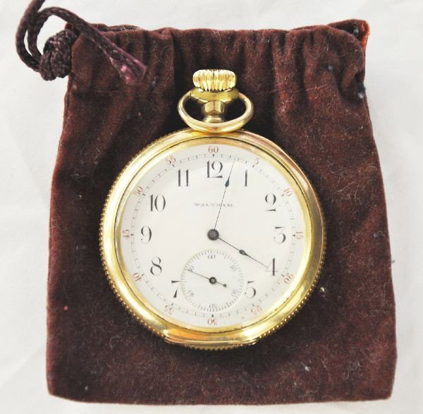 Early Waltham Pocket Watch: 2" open face, serial #7735070, Keystone gold filled watch case, serial #2990487, dust cover engraved 4/14/1879 , F.E.. Hayden, September 20, 1953. Shows some edge wear, mechanism is functional.