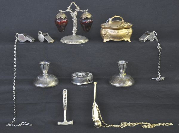 Ten Piece Miscellaneous Lot: Brass police whistle, two military whistles with chains, traffic special whistle, McCowans Toffee hammer, plated strawberry salt and pepper rack, telescoping bicycle cup. JB porcelain trinket box with
