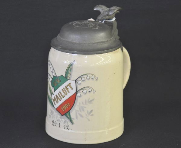 Early Mettlach Half Pint Stein: Stamped 1526, hand painted in ceramic with pewter top and eagle grip. Front dated 29.1.12 V.V. Mailuft 1901. Shows age but no damage.