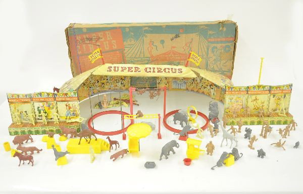 Boxed Marx Super Circus Playset: Circa 1940's One of the most popular Marx play sets. The super circus incorporates litho tin big top and side show pieces, with a host of circus figures, animals and accessories. Appears complete but 