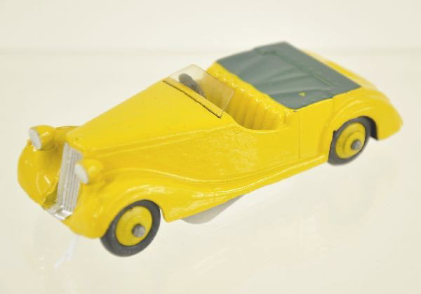 Unusual Dinky Toys 38B Sunbeam-Talbot: Circa 1950's, unusual yellow color with green boot, original windscreen, clean and shiny, showing very light playwear.
