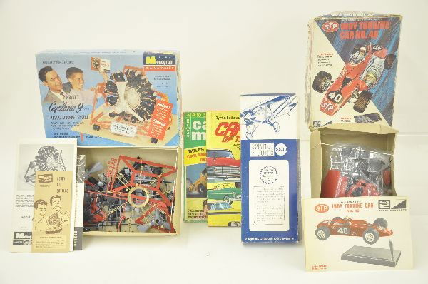 5 pc. Assorted Automobile & Plane Models and Books: Monogram Cyclone Radial Aircraft engine model in original box with instructions, unbuilt, most parts on trees, with all paperwork. Nice original box; MPC STP Indy Turbine Car Model No.40, 1/20 scale i