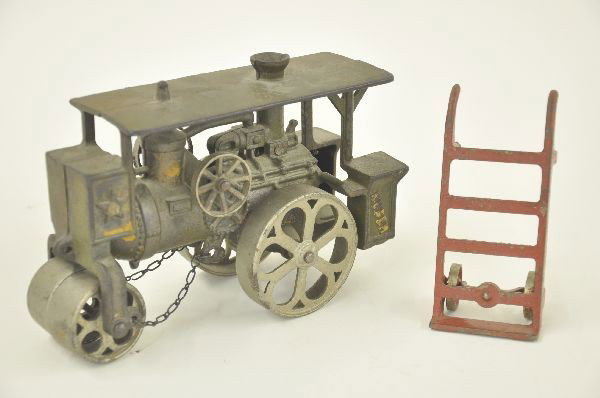 Hubley Huber Roller and Hand Truck: Circa 1920's 8" Road Roller painted and plated cast iron, couple of small rust spots, but overall 80% paint. One rear step and chain missing, otherwise shows moderate playwear. Plus a 6" hand truck th