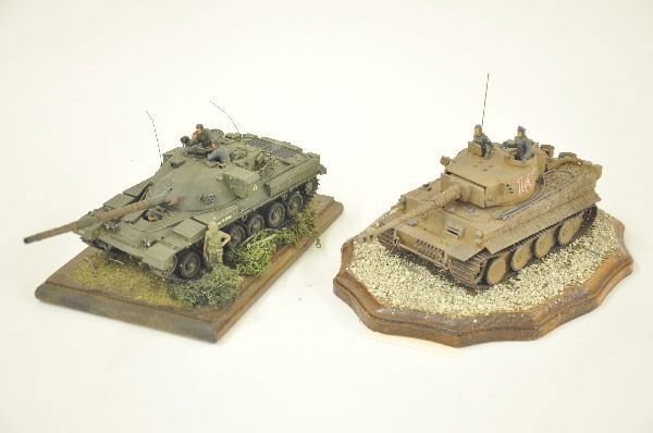 German and US WW II Tank Dioramas: 12" bases, German Tiger Tank and crew in desert colors. Second is US tank and crew. Tank labeled "Al Capone". Both highly detailed