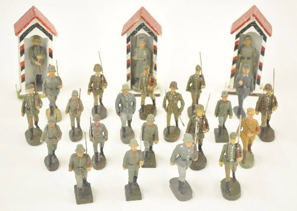26 Piece Composition Figure Lot: Includes Elastolin, Lineol and FF figures with three guard houses and one scarce Elastolin brown shirt. All show normal age wear. Nice assortment.