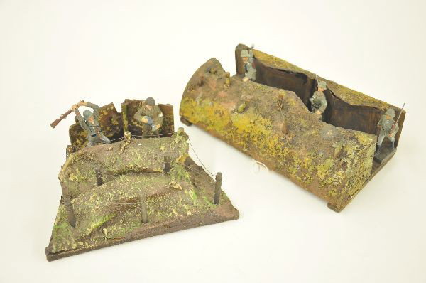 Two Super Early Hausser Trenches: 9" straight trench with original wire, includes three Lineol figures, 7" curved trench with original wire, includes scarce Elastolin medic pouring coffee, touched up, also unmarked soldier yielding gu