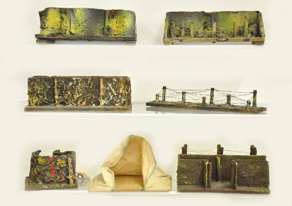 Six Nice Hausser Trenches: Great group of pieces all in similar color hue, lot includes two 8" fence trenches one has minor paint and is missing a post. 8" walking trench, 9" barbed wire unit, scarce 4" corner unit and 7" trenc