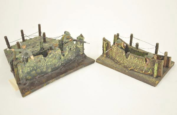 Seven Piece German Trench & Figure Lot: Super Hausser 7" trench with 3 Lineol figures, clean and bright with original barbed wire. 4" trench with two kneeling figures, earlier version in earth tones, shows light to moderate playwear