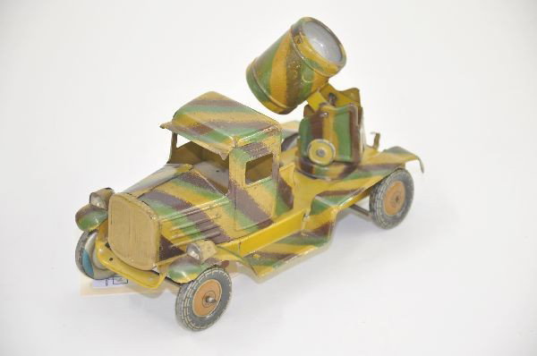 Early Lineol Searchlight Truck: Circa 1930's battery operated, untested with wind-up drive, mechanism functional. Appears to be missing second set of rear wheels. Otherwise shows light to moderate playwear.