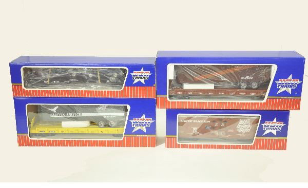 4 Boxed USA G-Gauge Cars: R16210 New Haven reefer; R17025 PA piggyback flatcar; 1720 D&RGW Flat car with cars; R17009 C&NW piggyback flat car. Otherwise, like new.