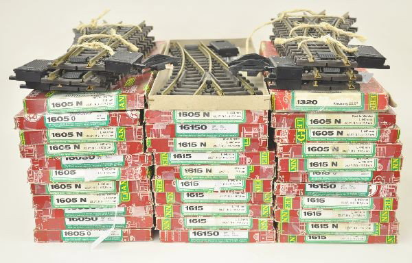 22 Pairs LGB G-Gauge Switches, Plus: 22 pairs of 1615/1605 remote switches, 19 pairs have original boxes. Boxed 1320 Cross track. About 20 manual uncoupling ramps, all show moderate playwear.