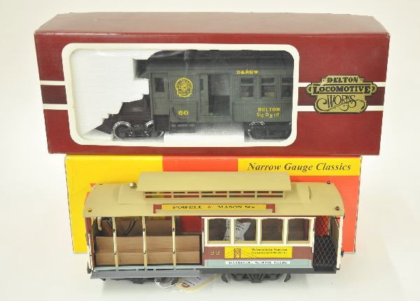2 G-Gauge Motorized Units: AMS San Francisco Cable Car; Delton 2264 Mack Rail Bus, original boxes, shows light playwear.